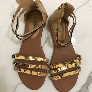 Gold and creme alligator flats